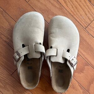 Birkenstock Tan Slip-On Clogs with Black Soles